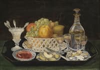 Table with fruit basket and dessert