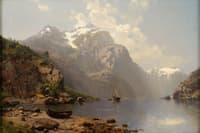 Alpine lake with a view of a mountain range