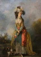 A Lady Walking with a King Charles Spaniel
