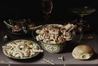 Three Dishes of Sweetmeats and Chestnuts with Three Glasses on a Table.