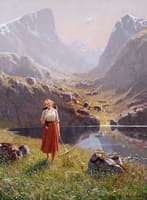 Girl by a mountain lake