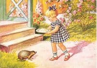 Girl Feeding a Hedgehog