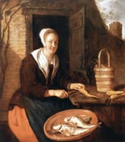 A Woman Cleaning Carrots