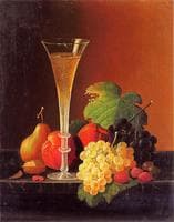 Fruit and a Glass of Champagne on a Tabletop