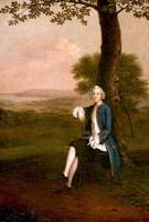 Portrait of a Young Man Sitting under a Tree