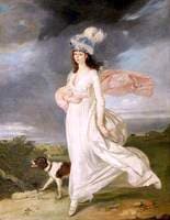 A Windswept Girl in a Turban Walking with a Dog