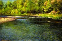 Iridescence of a Shallow Stream