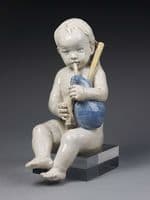 Boy Playing the Bagpipes