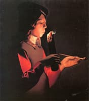 Boy Blowing on a Firebrand