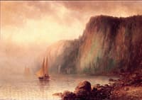 Sunlit Coastal Cliffs and Sea