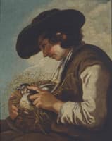 A young boy with a bird