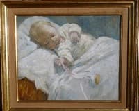 A Baby in a Cot