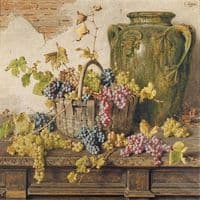 A basket of grapes by an amphor on a wooden table