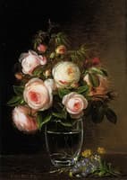 Roses in a glass vase with yellow buttercups, forget-me-nots and chickweed on a marble ledge