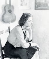Girl seated in an interior