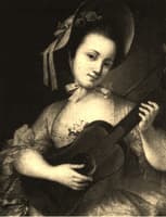 Portrait of a woman playing a guitar