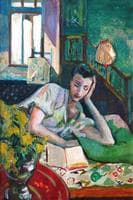 Woman Reading in Bed