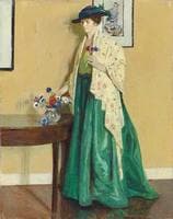 Lady in an interior arranging flowers