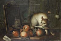 A cat holding a fish in its mouth, beside a mirror and peaches on a table