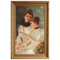 Two young ladies reading a book