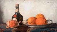 Oranges on a plate, with a Benedictine bottle