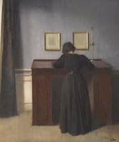 Ida Standing at a Desk