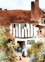 Girl and Cat Outside Cottage