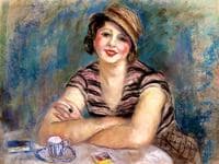 Femme brune attablé devant une tasse de café
