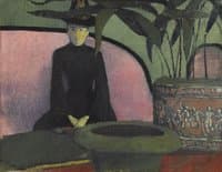 Woman Sitting on Pink Couch