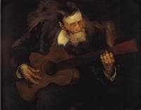 Hombre tocando la Guitarra