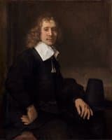 A Young Man Seated at a Table (possibly Govaert Flinck)