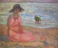 A girl in a pink robe by the sea
