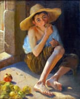 Chico comiendo fruta
