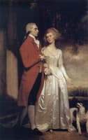 Sir Christopher and Lady Sykes strolling in the garden at Sledmere