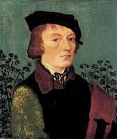 Portrait of a Man in front of a Rose Hedge
