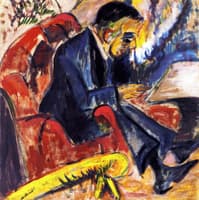 Man Sitting on a Park Bench