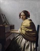 A Young Woman Seated at the Virginal