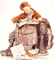 Little boy writing a letter
