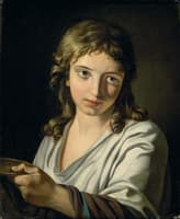 A Young Boy Holding a Dish