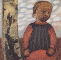 Girl in a red dress by a tree trunk