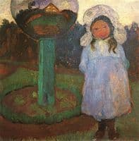 Girl in the garden near the crystal ball