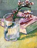 Blossoming Almond Branch in a Glass with a Book