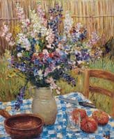Still life - vase of flowers and oranges